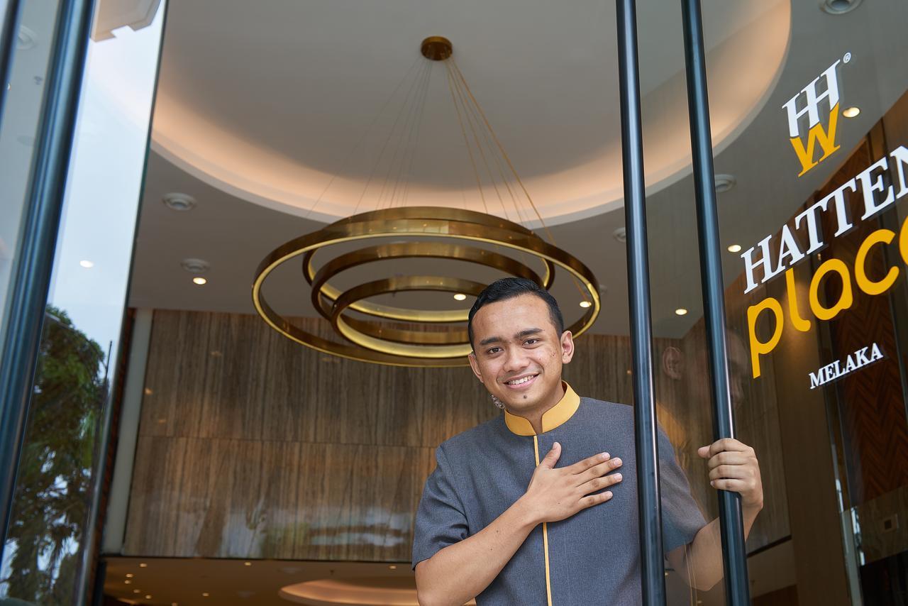 Hatten Place Melaka Luaran gambar A doorman at the entrance of a hotel in Malaysia.